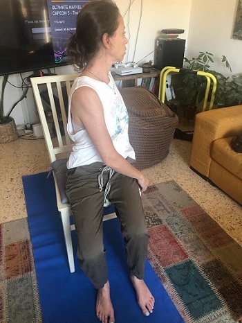 supine twist stretch on a chair